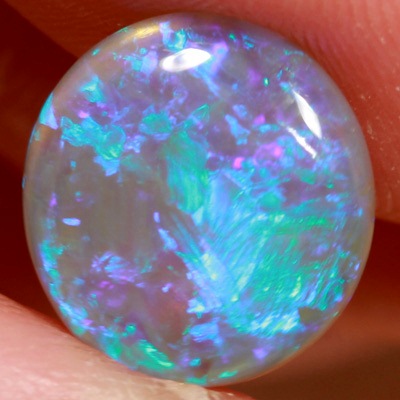 SOLID CRYSTAL OPAL Blue fire in a very 3 dimensional play of colour. Bright, clean colours. With VIDEO